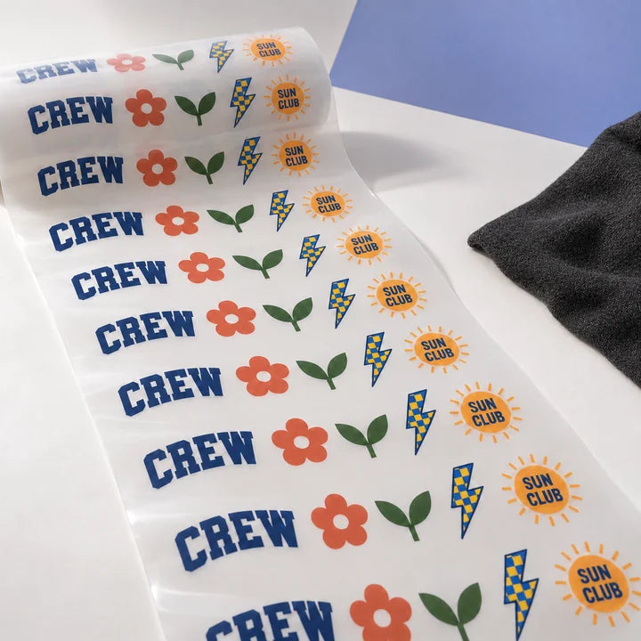 Mockup: a long printed DTF run beside a small plain fabric section